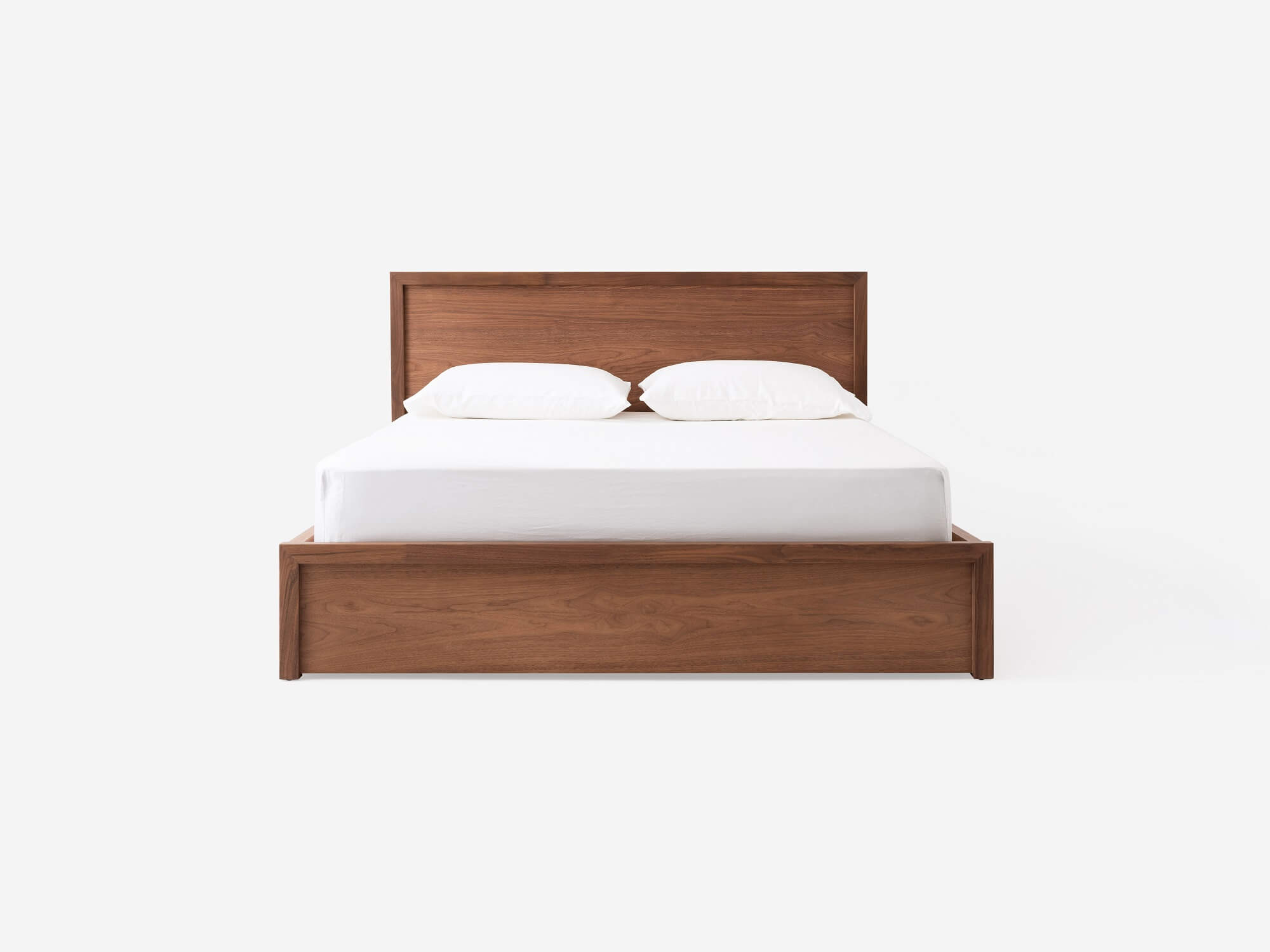 Front view of our walnut Marcel panel bed